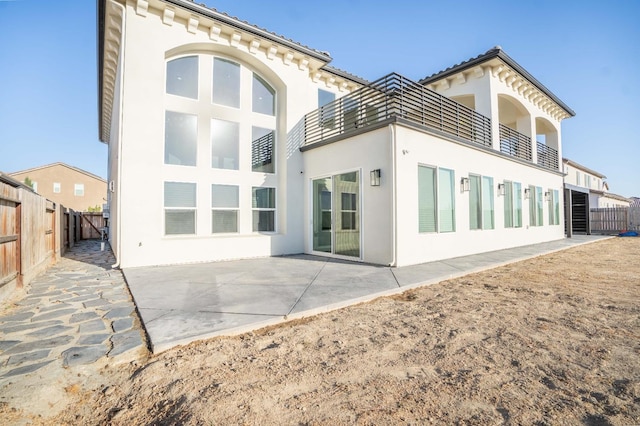 back of property with a patio area