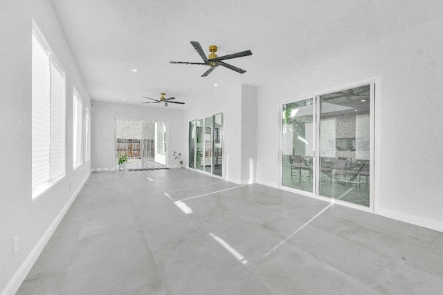 interior space featuring ceiling fan