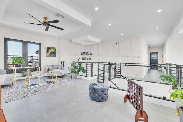 living room featuring ceiling fan