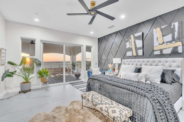 tiled bedroom featuring ceiling fan and access to exterior