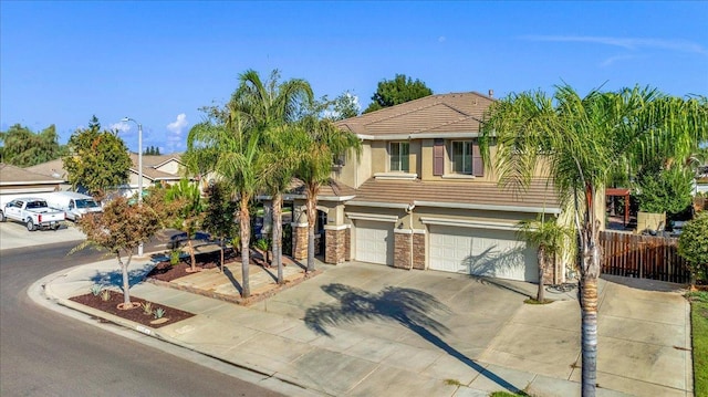 view of front of home with a garage