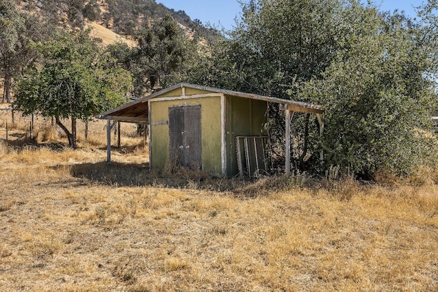 view of outdoor structure with a mountain view