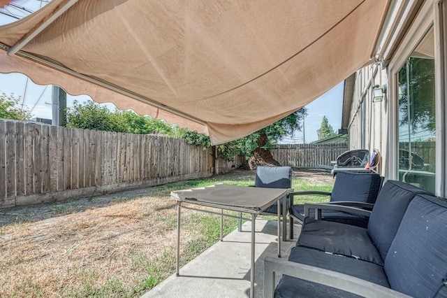 view of patio with a fenced backyard