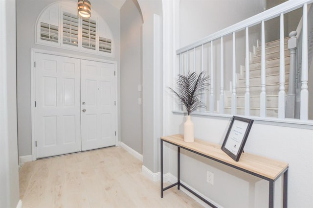 foyer entrance featuring light wood-type flooring