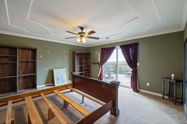 bedroom featuring access to outside, carpet floors, crown molding, and a textured ceiling