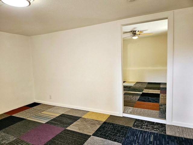 unfurnished room featuring ceiling fan