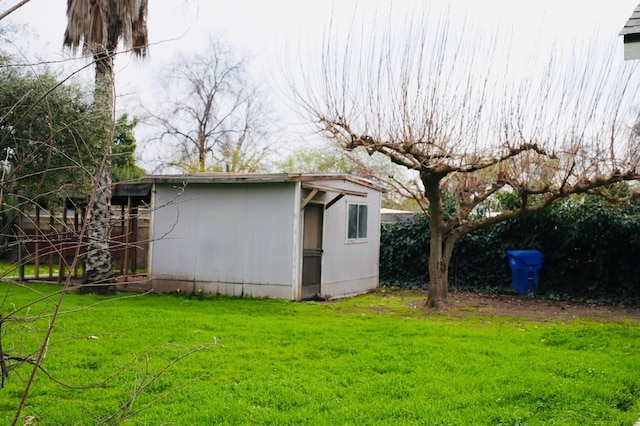 view of outdoor structure with a yard