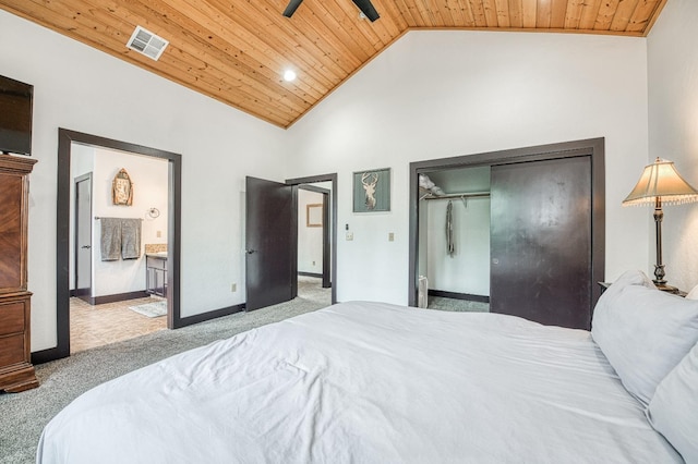 bedroom with ceiling fan, high vaulted ceiling, a closet, wooden ceiling, and light carpet