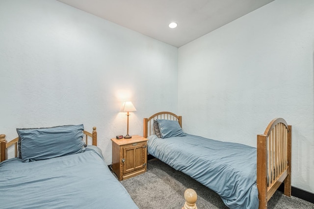 bedroom featuring carpet