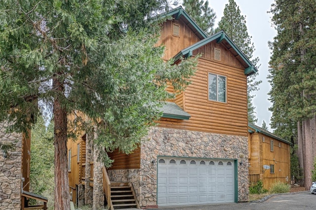 view of front of property with a garage