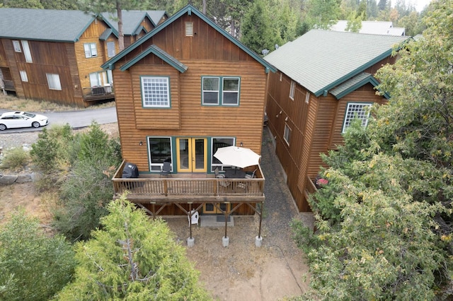 rear view of house with a deck