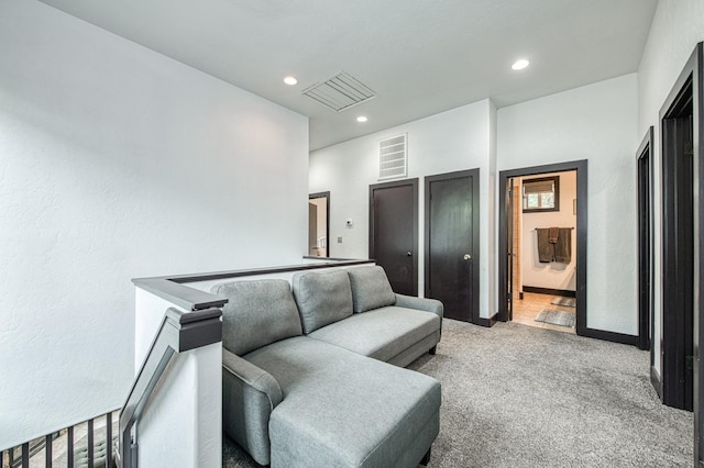 living room featuring light colored carpet