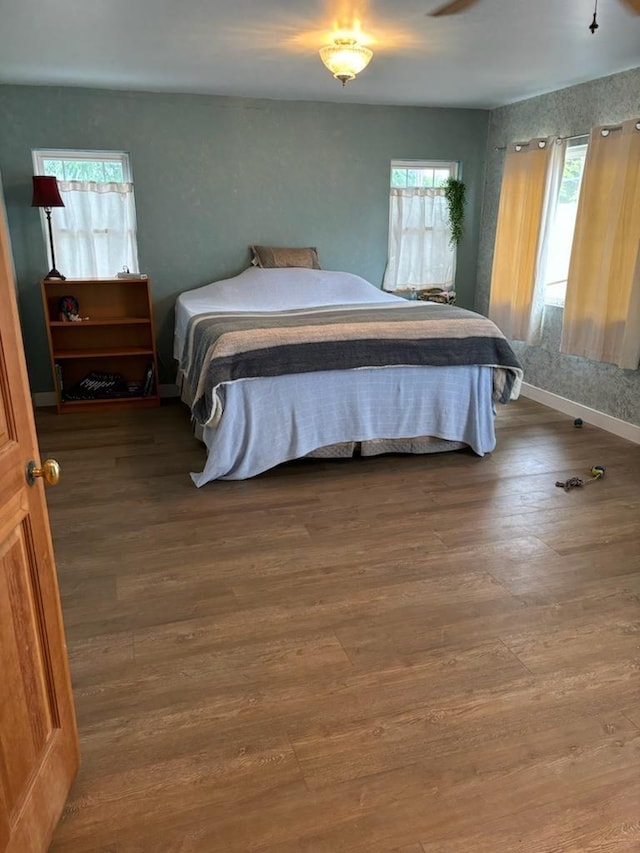 bedroom featuring hardwood / wood-style flooring