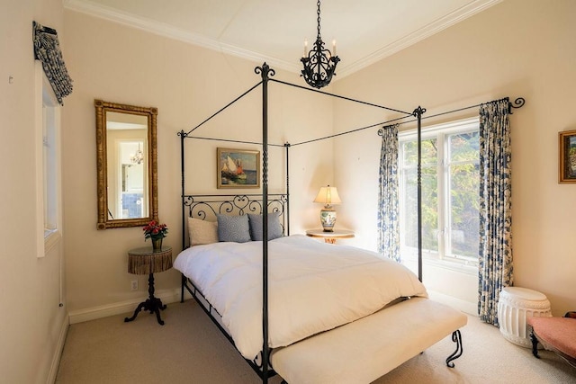 carpeted bedroom featuring access to outside, ornamental molding, and an inviting chandelier