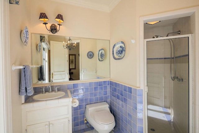 bathroom with vanity, a notable chandelier, crown molding, an enclosed shower, and toilet