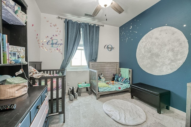 bedroom with ceiling fan and carpet