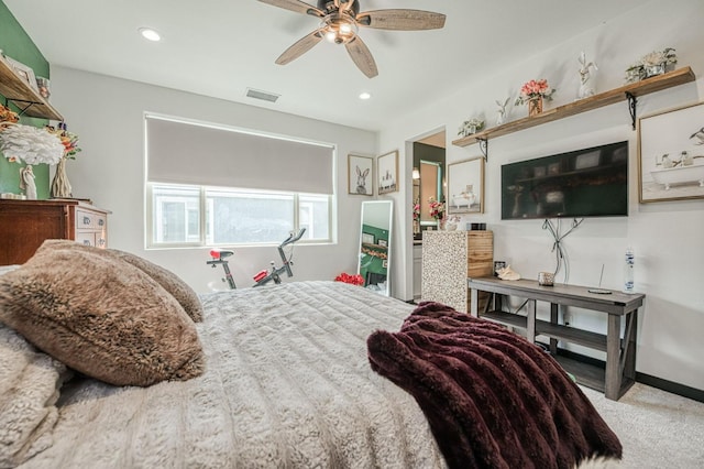 carpeted bedroom featuring ceiling fan