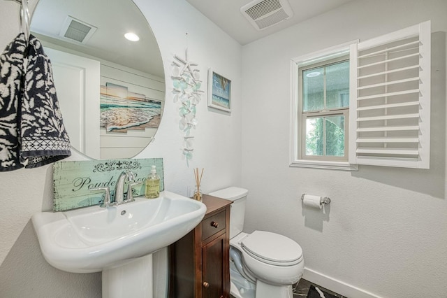 bathroom featuring sink and toilet