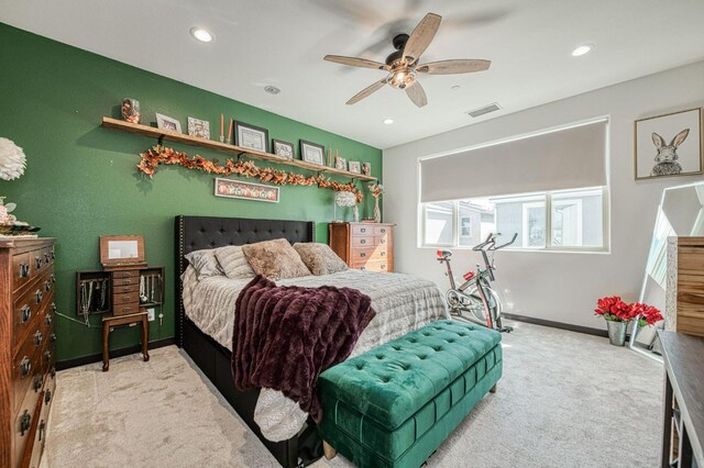 bedroom with ceiling fan and carpet flooring