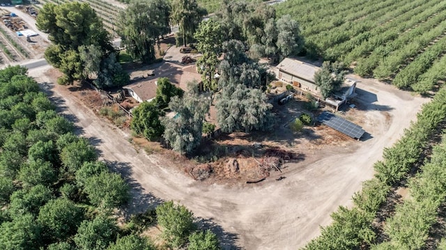 birds eye view of property with a rural view