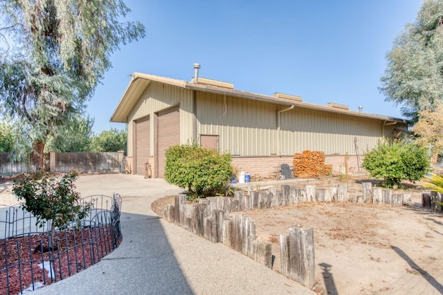 view of property exterior with a patio