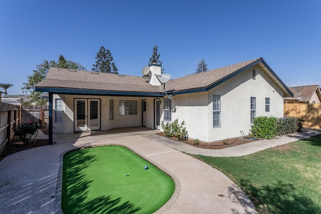 back of property featuring a patio area