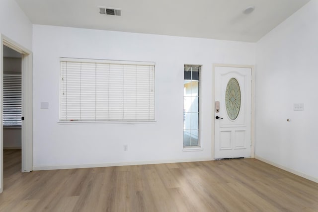 foyer entrance featuring light hardwood / wood-style floors