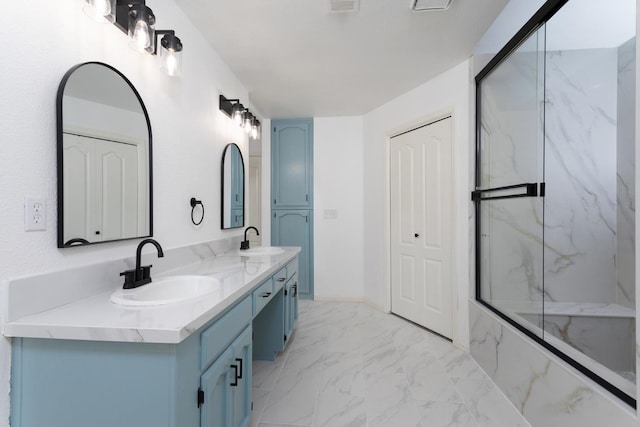 bathroom with vanity and walk in shower