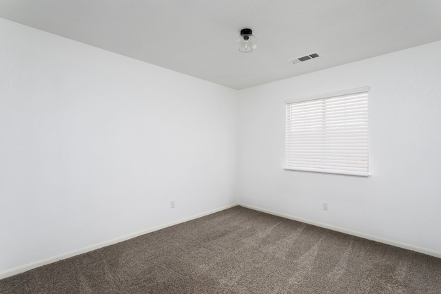 empty room with carpet floors