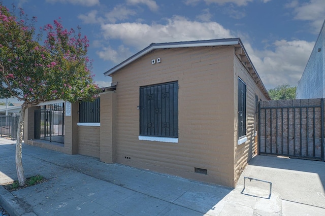 view of side of property featuring a patio