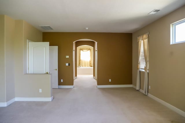 view of carpeted spare room