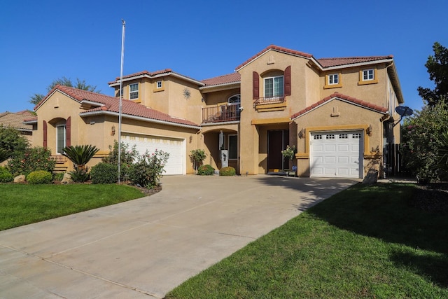 mediterranean / spanish house with a garage, a front yard, and a balcony