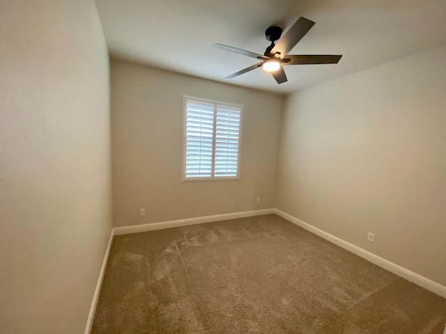 unfurnished room with carpet floors and ceiling fan