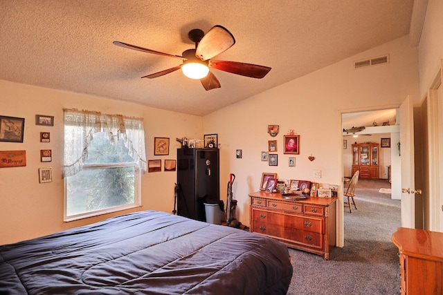 3363 S Anchor Ave, Orange Cove, CA 93646 - bedroom with carpet flooring, visible vents, a textured ceiling, and lofted ceiling