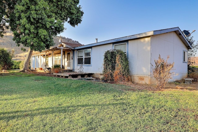 3363 S Anchor Ave, Orange Cove, CA 93646 - view of front of property with a front lawn