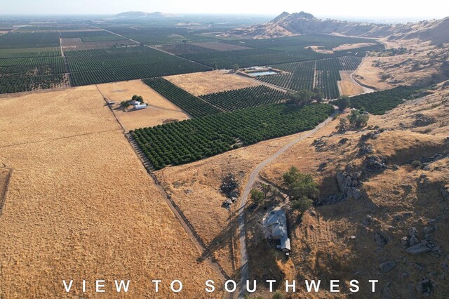 3363 S Anchor Ave, Orange Cove, CA 93646 - bird's eye view featuring a rural view and a mountain view