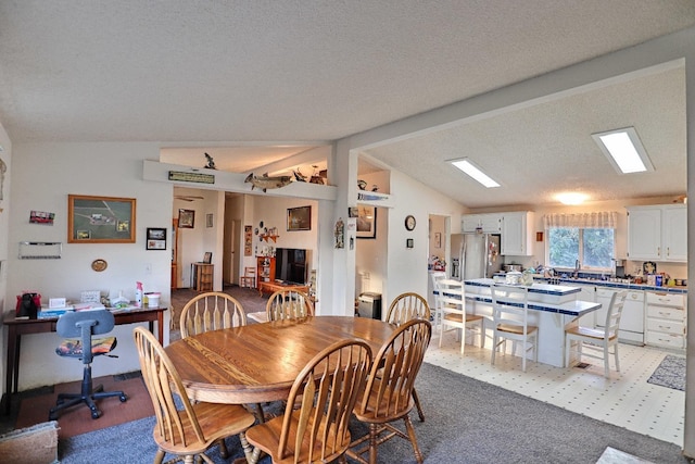 3363 S Anchor Ave, Orange Cove, CA 93646 - carpeted dining room with vaulted ceiling