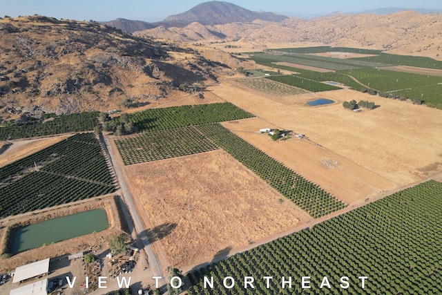 3363 S Anchor Ave, Orange Cove, CA 93646 - drone / aerial view with a rural view and a mountain view