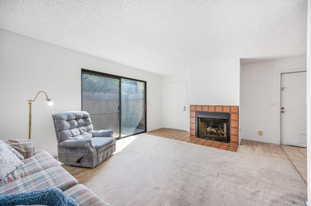 living room featuring light carpet and a textured ceiling