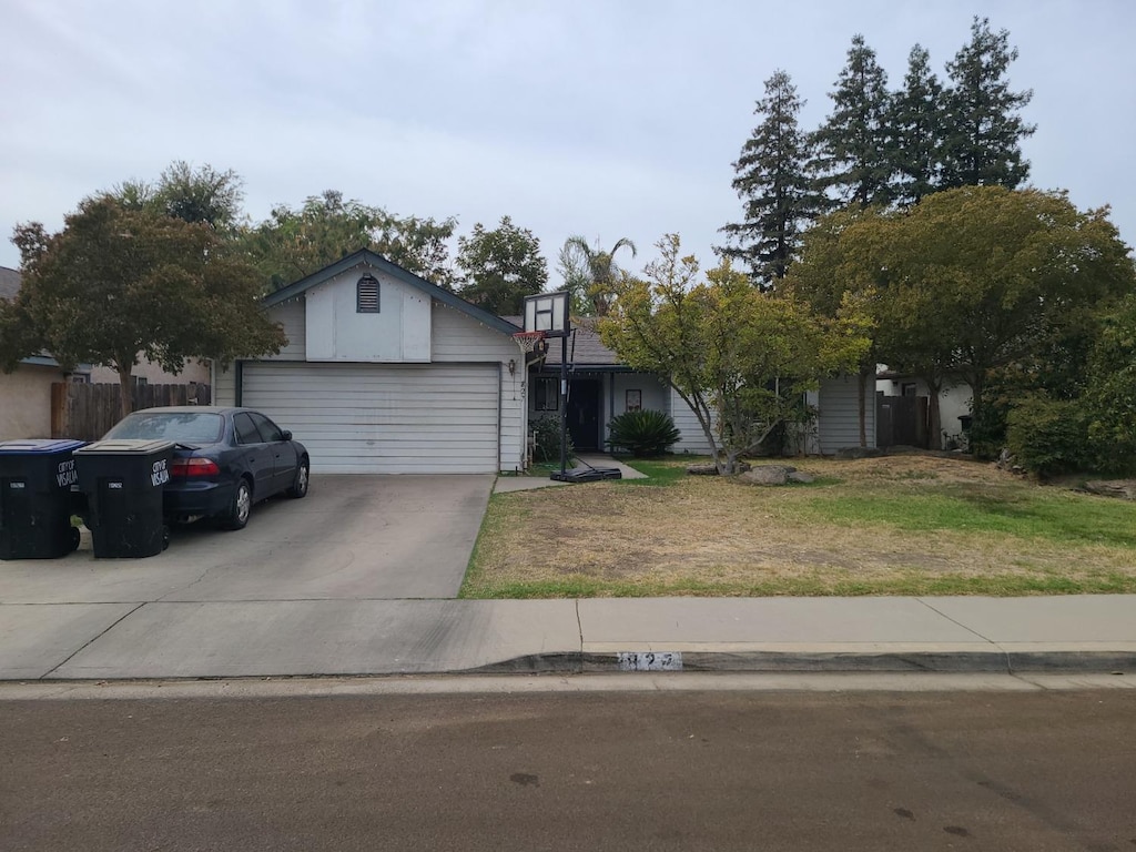 ranch-style home featuring a garage