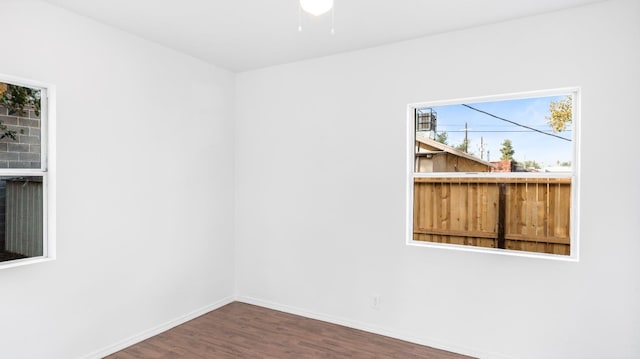 spare room featuring hardwood / wood-style floors