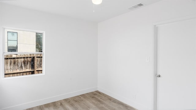 unfurnished room featuring light hardwood / wood-style flooring