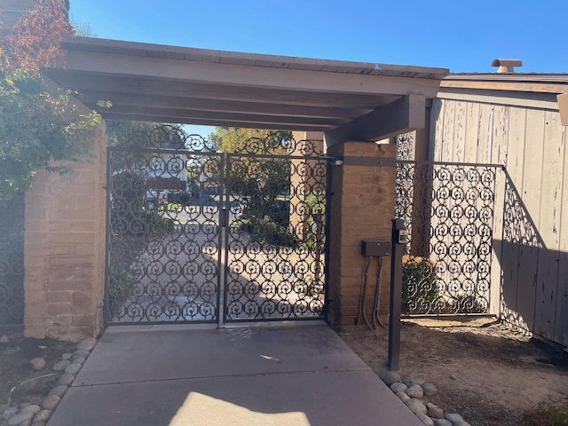 view of gate with a carport