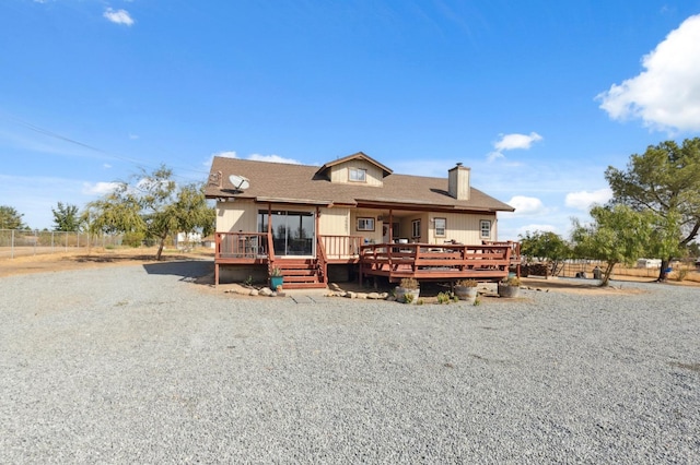 view of front of home featuring a wooden deck