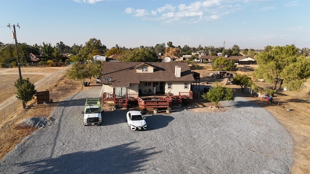 view of front of property with a wooden deck