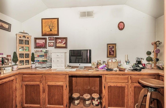 bar with lofted ceiling