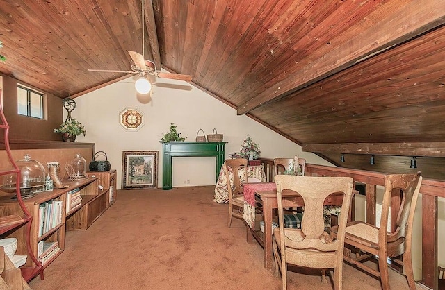 carpeted bedroom featuring wooden ceiling, vaulted ceiling with beams, and ceiling fan