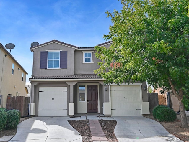 view of front of property with a garage