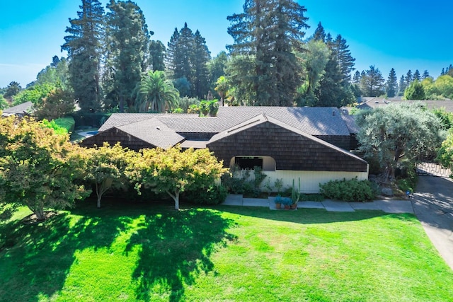 exterior space with a front yard