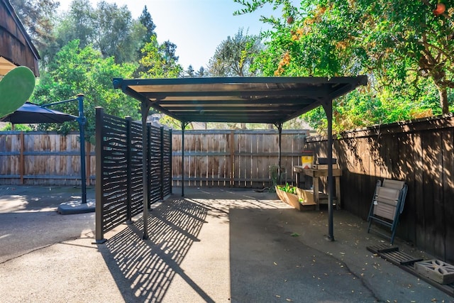 view of patio / terrace featuring a carport